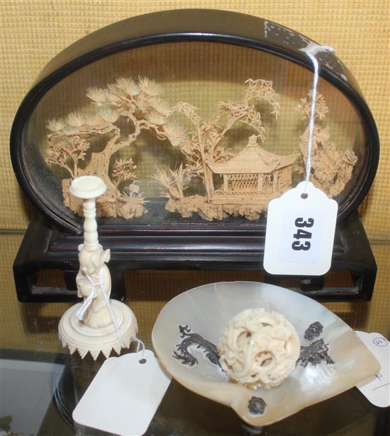 Chinese carved ivory concentric ball on stand, mother of pearl ashtray with white metal dragon mount & a framed cork temple carving